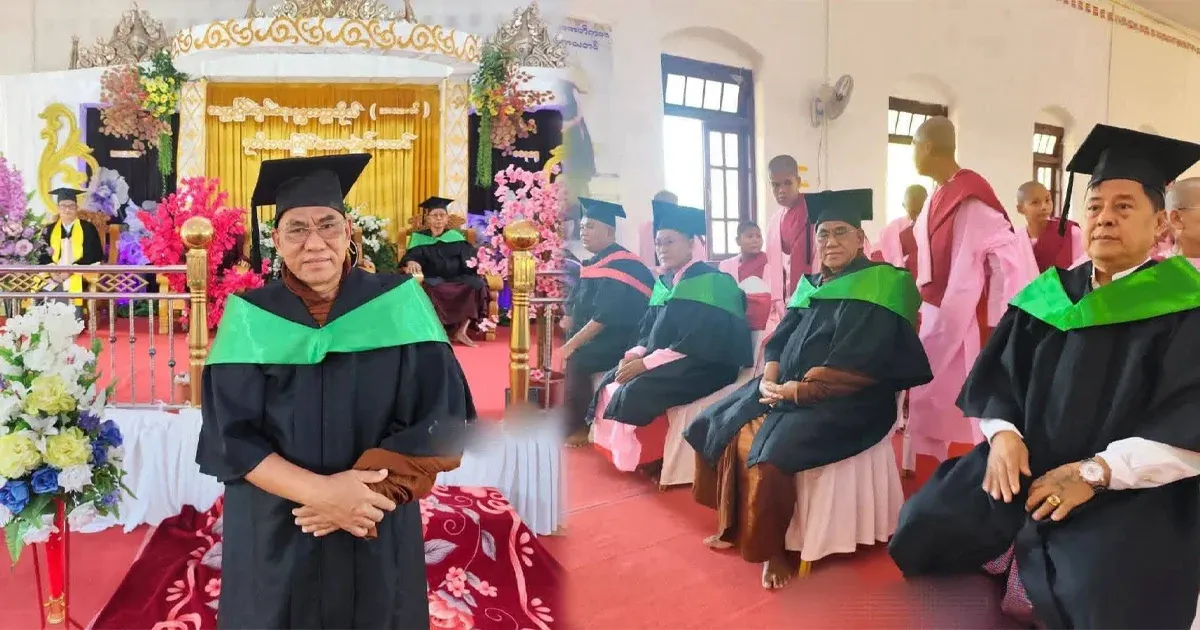 The ceremony is over as the priest wears his graduation gown and receives the award